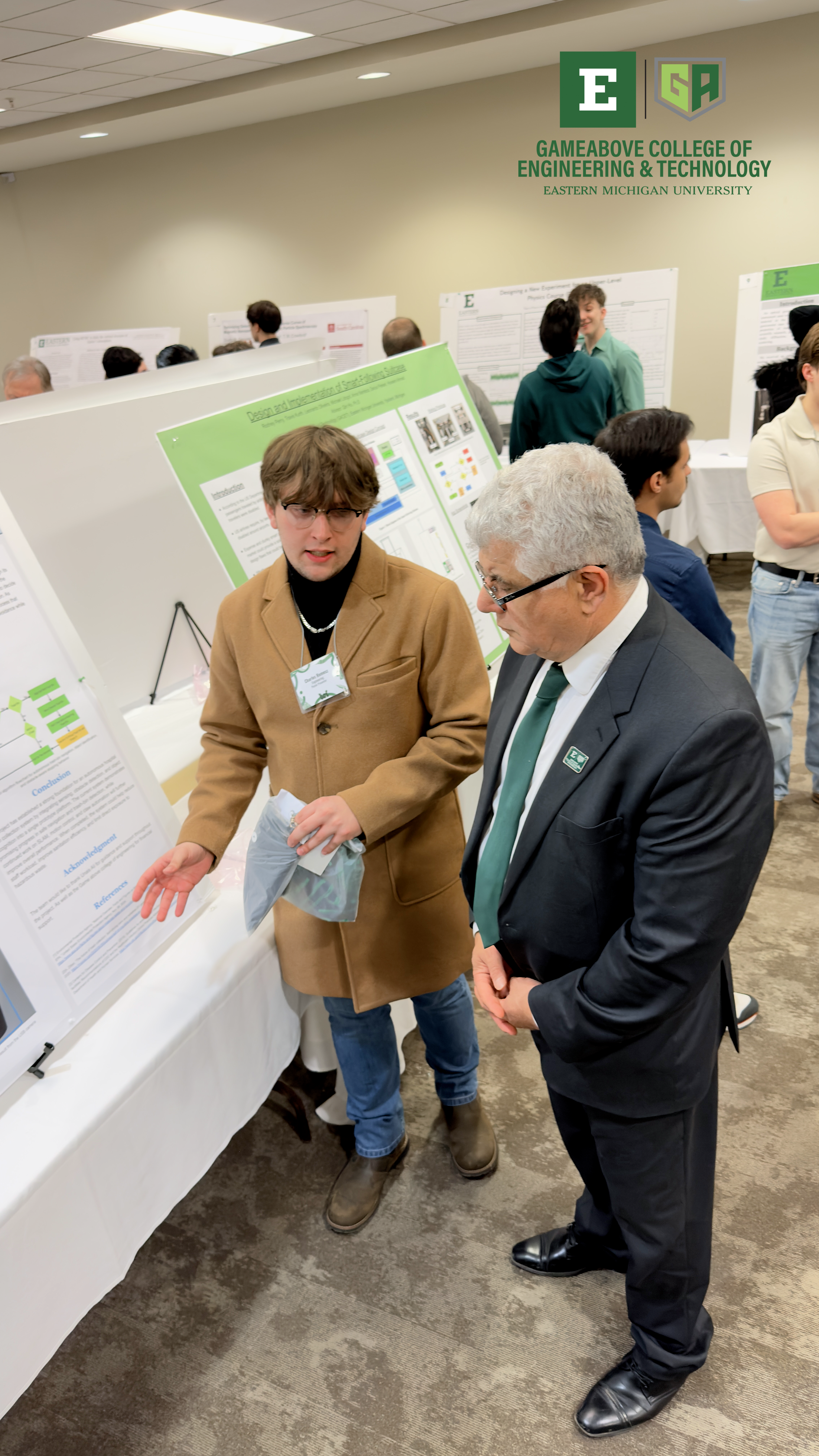 Eastern Michigan University, photo of the Dean and a student